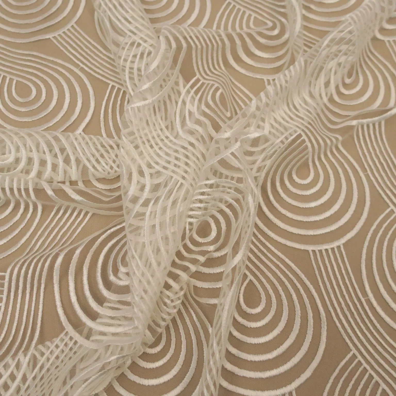 Ivory Swirls Embroidered Tulle Fabric