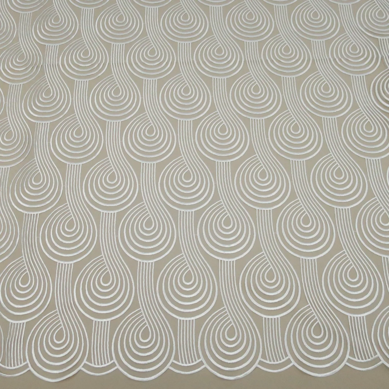 Ivory Swirls Embroidered Tulle Fabric